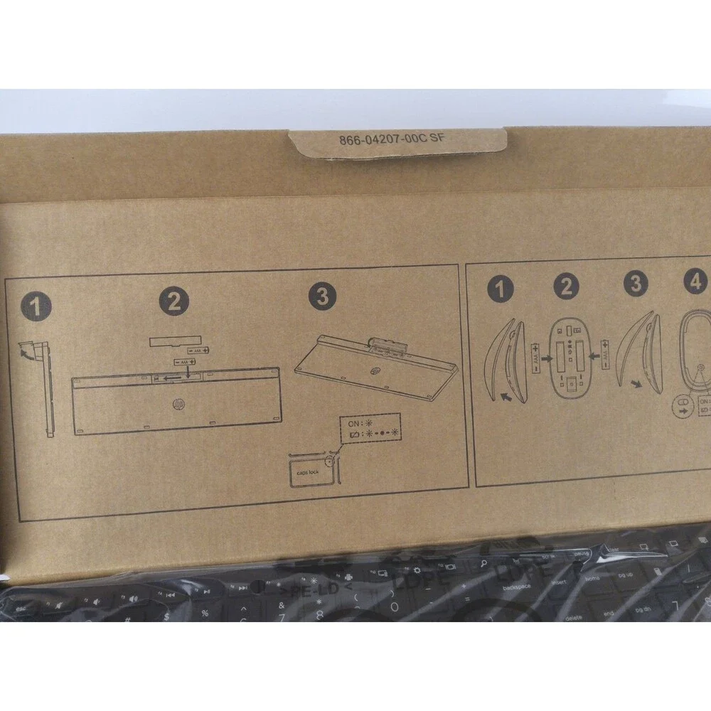 Slim Keyboard and wireless mouse Never used still in box with plastic